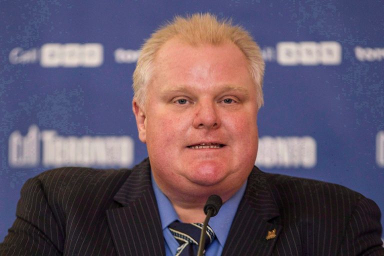 FILE - In this Tuesday, December 10 2013 file photo, Toronto Mayor Rob Ford speaks in Toronto.  Rob Ford's lawyer said on Wednesday, April 30, 2014, that Ford will take a leave of absence to seek help for substance abuse. (AP Photo/The Canadian Press, Chris Young File)