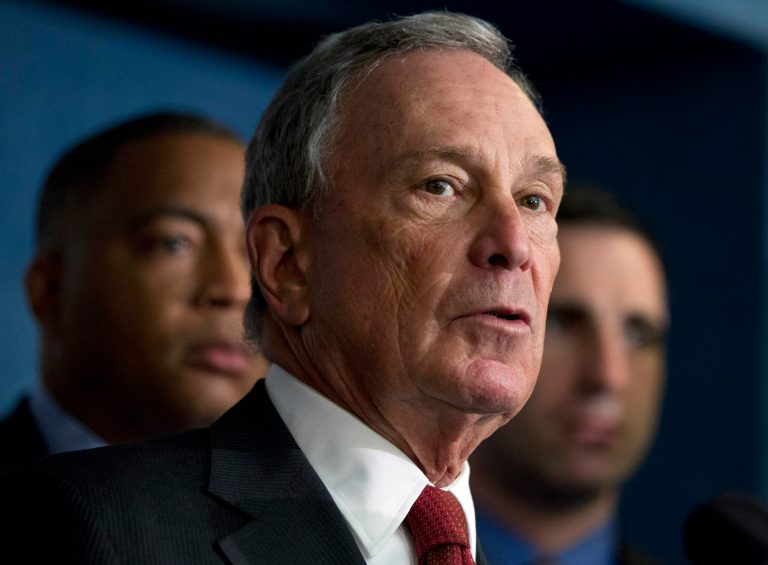   FILE - In this April 11, 2012 file photo, New York City Mayor Michael Bloomberg, center, speaks in Washington. New York Cityâs billionaire mayor is using his personal fortune to try to spark innovation in the nationâs cities. The mayor tells The Associated Press that his organization, Bloomberg Philanthropies, is inviting the mayors of the nationâs 1,300 largest cities to compete for five prizes totaling $9 million. (AP Photo Manuel Balce Ceneta, File)  