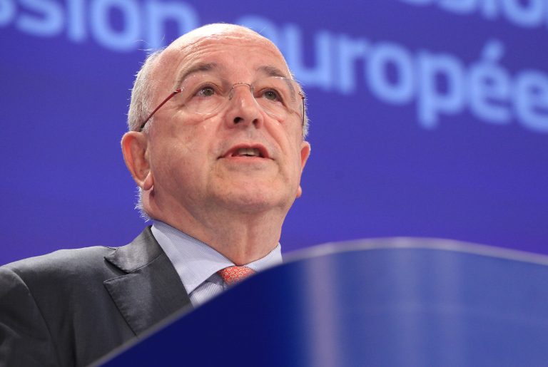 European Commissioner for competition Joaquin Almunia addresses the media at the European Commission headquarters in Brussels, Wednesday, June 11, 2014. The European Union's antitrust regulator said Wednesday it is launching an investigation into tax deals that Apple, Starbucks and Fiat struck with several European countries to see whether they violate competition law. (AP Photo/Yves Logghe)