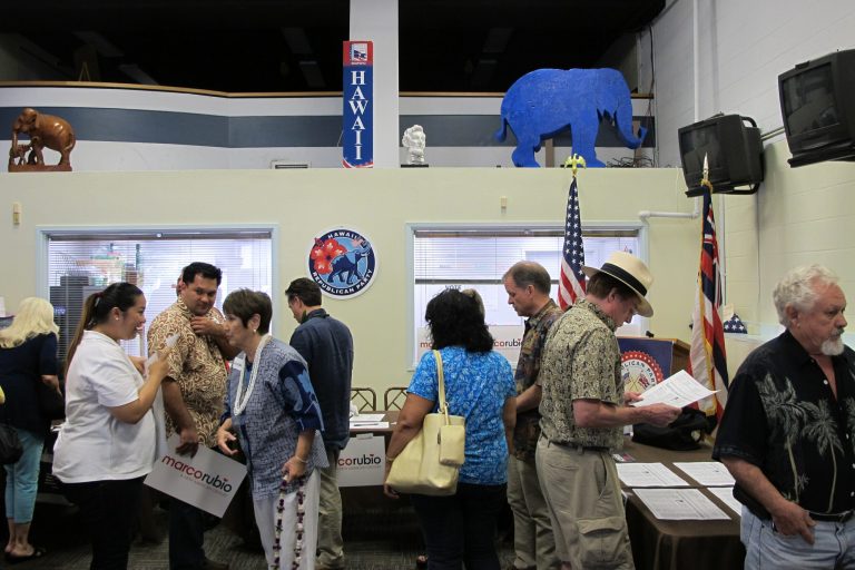 Voters in Hawaii, Mississippi, Michigan and Idaho head to primaries or caucus sites Tuesday to have their say in the Republican presidential primary process. (AP Photo/Cathy Bussewitz)