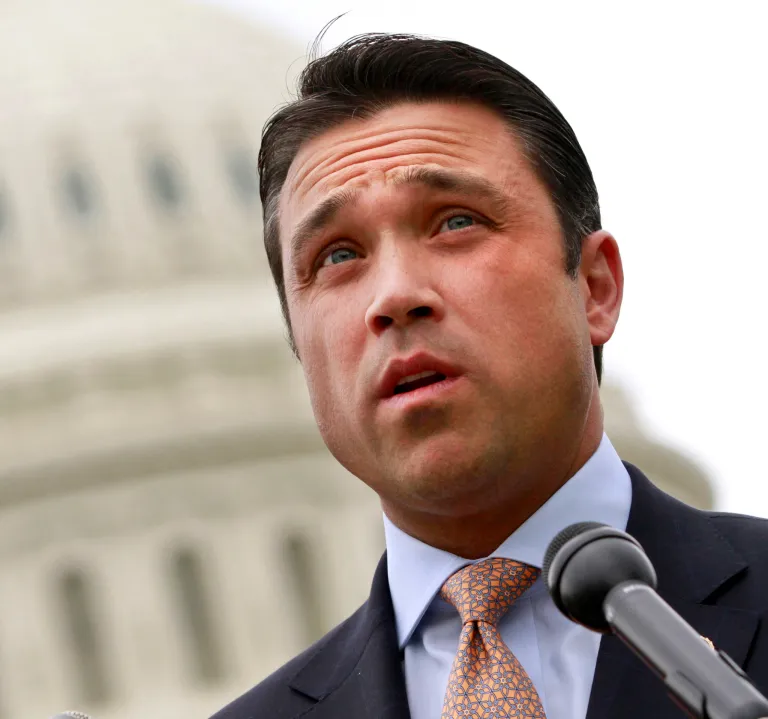 Rep. Michael Grimm, R-N.Y. speaking on Capitol Hill in Washington. Grimm is defending his actions after he physically threatened a reporter at the Capitol after President Barack Obama's State of the Union address Tuesday. (AP Photo/Jacquelyn Martin, File)