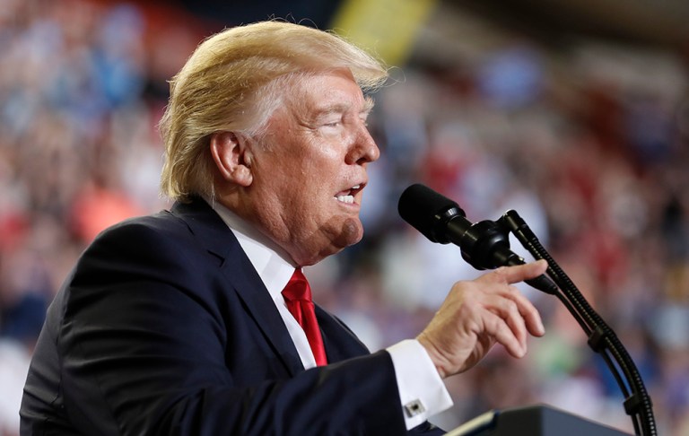 President Trump gave a warm shoutout to someone in the audience holding a "Blacks for Trump" sign during his rally in Harrisburg, Pa., on Saturday.