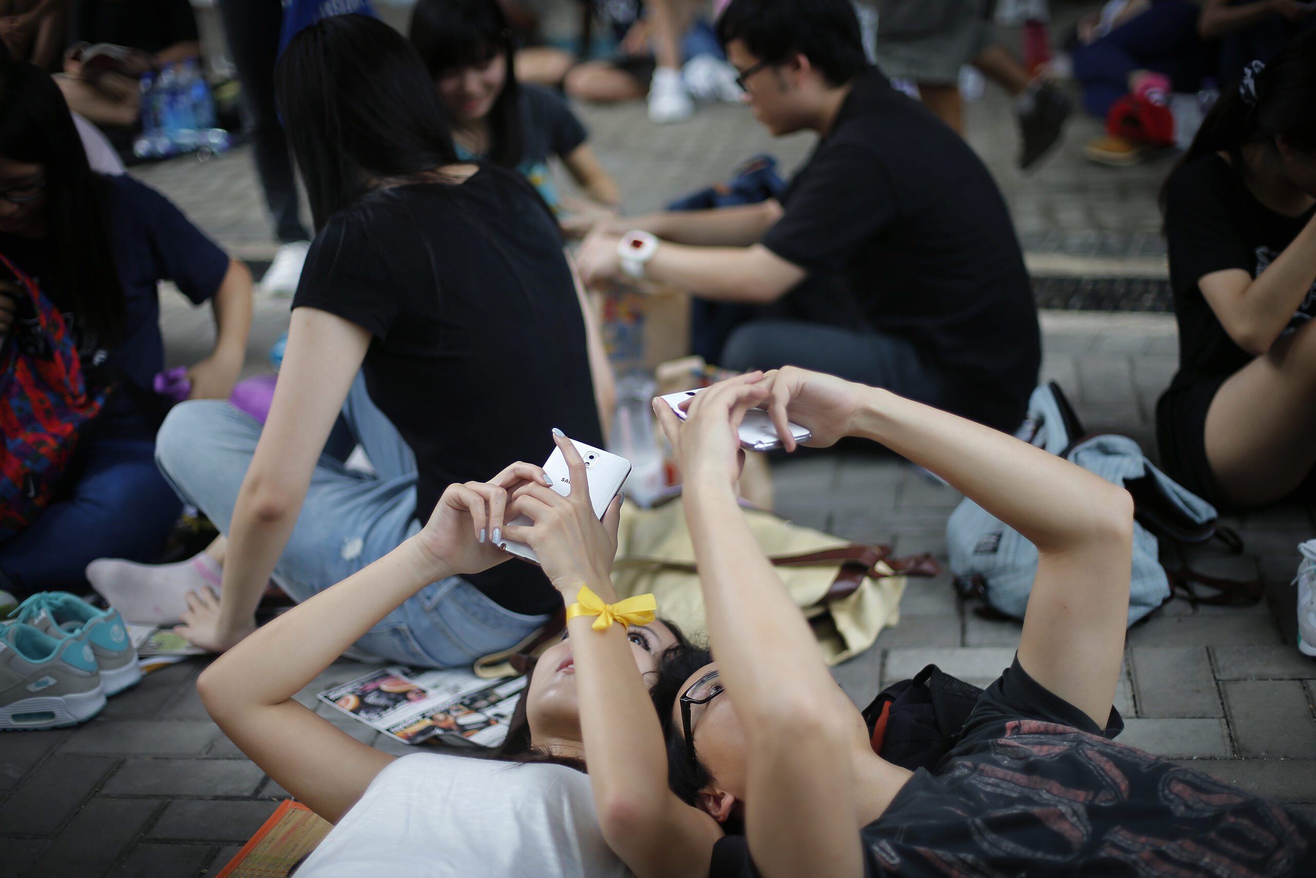 Firm says phone apps spy on Hong Kong protesters