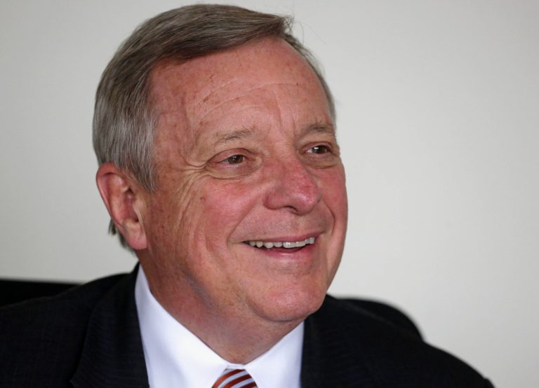 FILE - In this Sept. 12, 2014 file photo, U.S. Sen. Dick Durbin D-Ill., answers questions during an interview with The Associated Press in Chicago. Durbin is running for re-election against Illinois state Sen. Jim Oberweis in the November election. Durbin and Oberweis disagreed on whether to require universal background checks for firearms purchases, during their their first joint, televised appearance of the 2014 campaign before the the Chicago Tribune editorial board Monday Sept. 29, 2014 in Chicago. (AP Photo/M. Spencer Green, File)