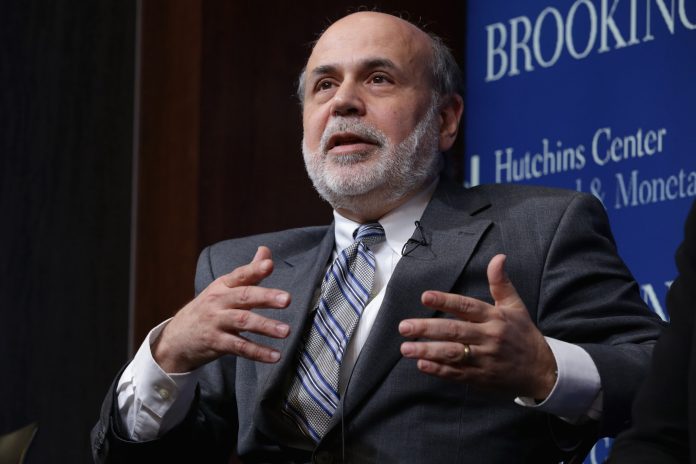 Former Fed Chairman Ben Bernanke participates in a panel discussion at the Brookings Institution March 2, 2015 in Washington. (Photo by Chip Somodevilla/Getty Images)