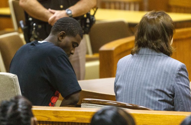   Desmonte Leonard makes his first appearance at the Lee County Justice Center, Thursday, June 14, 2012, in Opelika, Ala., after being transported from Montgomery, Ala., where he turned himself in Tuesday. Leonard is accused of shooting six men, resulting in the deaths of three, including two former Auburn University football players. The shooting occurred at University Heights apartment complex on West Longleaf Drive in Auburn Saturday night. (AP Photo/Opelika-Auburn News, Vasha Hunt, Pool)  