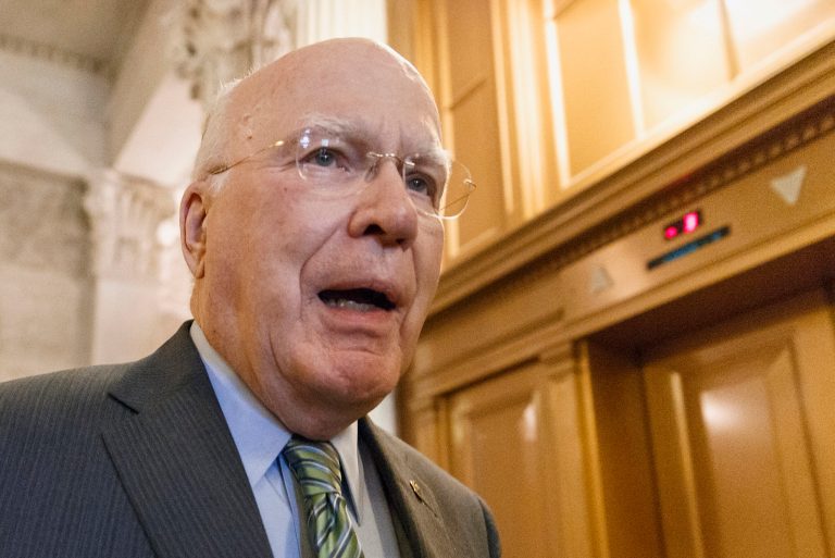 FILE - This March 11, 2014 file photo shows Senate Judiciary Committee Chairman Sen. Patrick Leahy, D-Vt. on Capitol Hill in Washington. The Obama administration says there are legal safeguards in place in the event suspected terrorists being held at Guantanamo Bay are ever relocated to the United States, and that detainees would be barred from receiving asylum and would have no right to remain in the country permanently. Leahy said a report to Congress lends support for lifting the congressional ban on transferring detainees to the US and should calm fears that it would harm public safety. (AP Photo/J. Scott Applewhite, File)