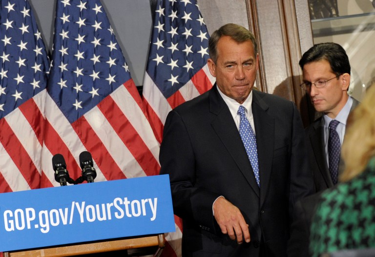 House Speaker John Boehner of Ohio, left, and House Majority Leader Eric Canton of Va., right, walk away from the microphones following a news conference after a meeting at the Republican National Committee offices on Capitol Hill in Washington, Wednesday, Oct. 23, 2013. (AP Photo/Susan Walsh)