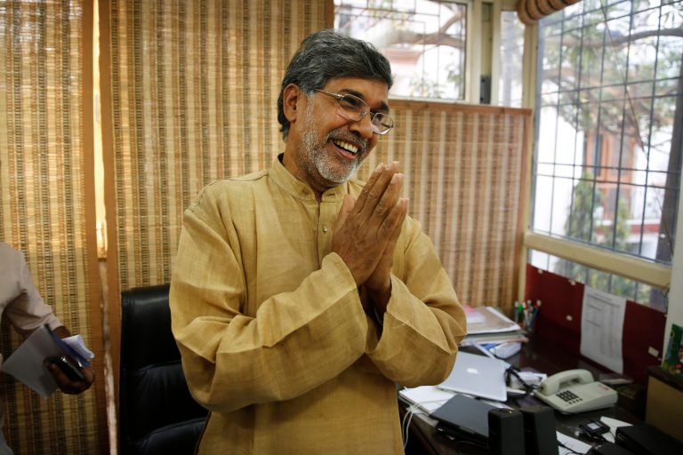 Indian children's rights activist Kailash Satyarthi gestures as he addresses the media at his office in New Delhi, India, Friday, Oct. 10, 2014. Malala Yousafzai of Pakistan and Satyarthi of India jointly won the Nobel Peace Prize on Friday, Oct. 10, 2014, for risking their lives to fight for children's rights. (AP Photo/Manish Swarup)