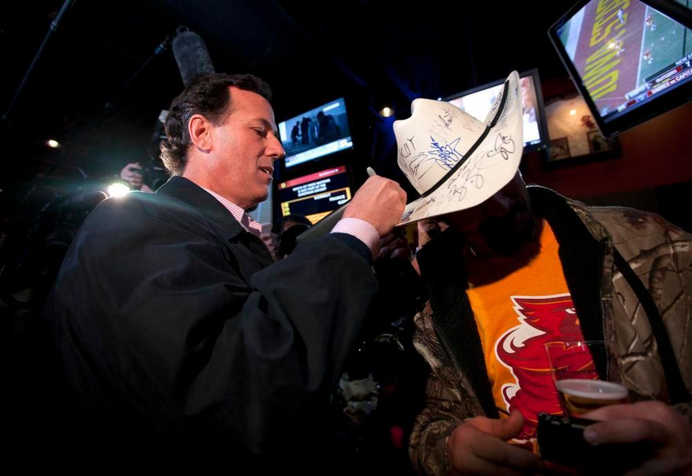 Santorum says he’s no Mike Huckabee