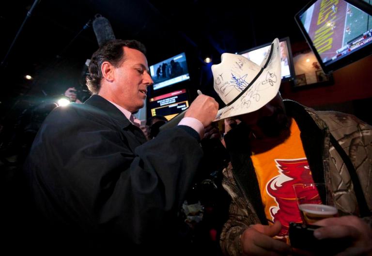 Santorum says he’s no Mike Huckabee