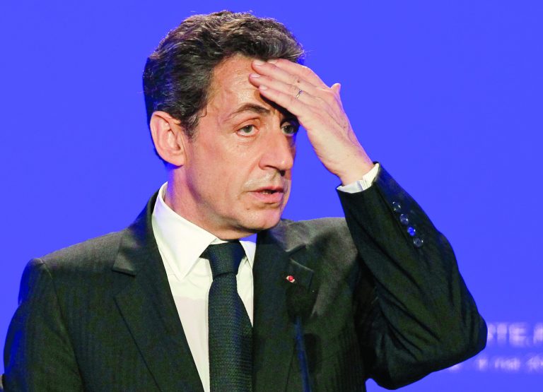 FILE - This Friday, May 4, 2012 file photo shows France's then President and conservative candidate for re-election in 2012, Nicolas Sarkozy as he delivers a speech in Sables d'Ollonne, western France. Sarkozy went before a judge on Thursday, Nov.22, 2012 to respond to suspicions he illegally accepted donations from France's richest woman to fund his 2007 election campaign. The judge in Bordeaux could decide whether the 57-year-old conservative, a polarizing figure who often faced criticism for cozy ties to the rich, will be charged with taking advantage of the 90-year-old L'Oreal heiress, Liliane Bettencourt. Sarkozy has consistently denied all allegations.(AP Photo/Michel Euler, File)