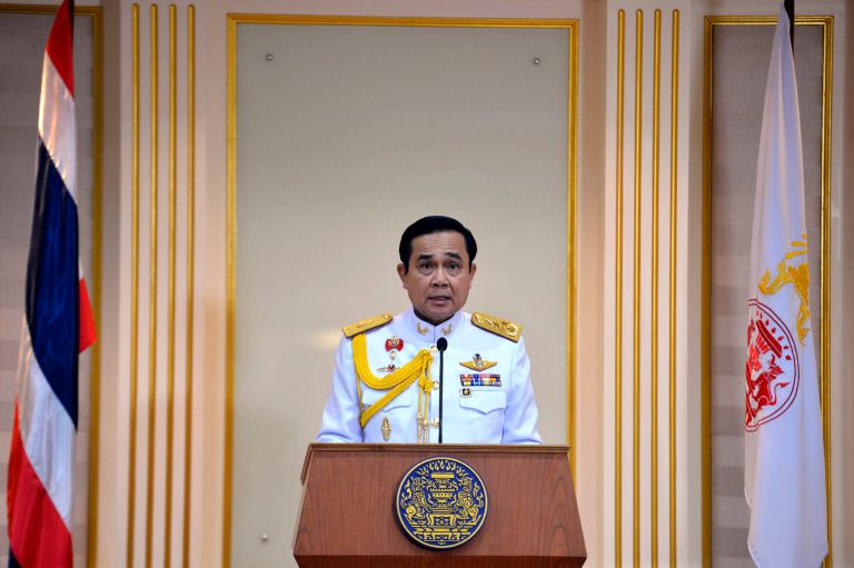 In this photo released by Thai Spokesman Office, Gen. Prayuth Chan-ocha speaks after he accepted a written royal command issued by King Bhumibol Adulyadej certifying his appointment as the country's 29th premier in Bangkok, Thailand Monday, Aug. 25, 2014. Thailand's junta leader, who seized power in a military coup three months ago, officially assumed his new post as prime minister on Monday following the endorsement from the country's monarch. (AP Photo/Thai Spokesman Office)
