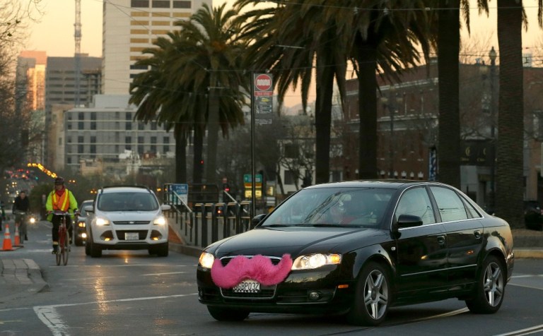 If Lyft persuades a federal judge to approve the accord announced in January, the company will be a step ahead of its larger rival Uber Technologies Inc. (AP Photo)