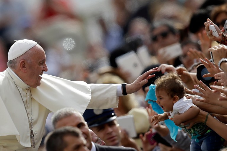 The White House on Friday tried to downplay the controversy surrounding its invitations for Pope Francis' U.S. visit next week. (AP Photo)