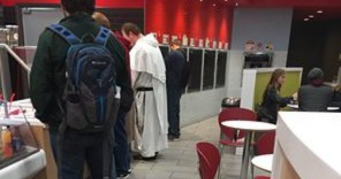 College students panic after someone reports ‘KKK member holding a whip,’ turns out to be a priest with rosary beads