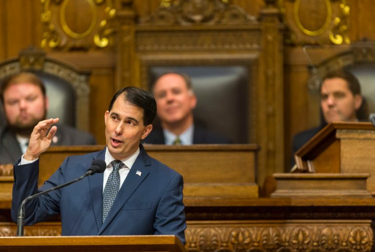 Wisconsin Gov. Scott Walker is pursuing that goal with a package of reforms to public assistance in the state budget, changes meant to move people from government programs to work. (AP Photo/Andy Manis)