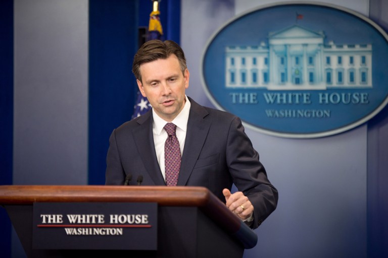 White House press secretary Josh Earnest sought to downplay the defection of 47 House Democrats on a GOP bill to halt the Obama administration's plan to allow 10,000 Syrian refugees into the U.S. this year. (AP Photo/Andrew Harnik)