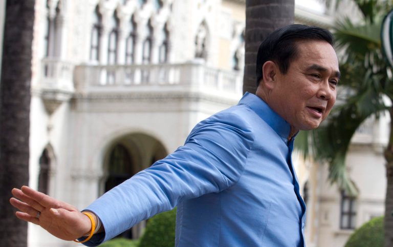 FILE - In this Sept 9, 2014 file photo, Thailand's Prime Minister Prayuth Chan-ocha leaves after his prayer at the spirit house for good luck before a meeting in the preparation for his cabinet meeting at the government house in Bangkok. Thailand's military has appointed a 250-member advisory group dominated by people close to the traditional ruling elite to help write a new national constitution. The new National Reform Council was officially endorsed by King Bhumibol Adulyadej and was announced Monday, Oct. 6. Prayuth said earlier that the council will consider political, economic, social, environmental, judicial and other matters. (AP Photo/Sakchai Lalit, File)