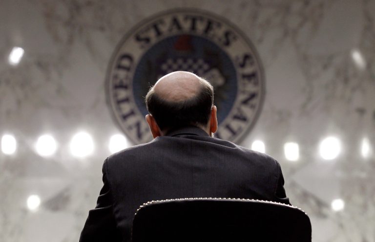 FILE - In this Tuesday, March 1, 2011, file photo, Federal Reserve Chairman Ben Bernanke gives the Semiannual Monetary Policy Report to Congress while testifying before the Senate Banking Committee on Capitol Hill in Washington. The tumultuous Ben Bernanke era at the Federal Reserve moves toward its close with the final policy meeting of his eight-year tenure scheduled for the last week of January 2014. (AP Photo/Alex Brandon, File)