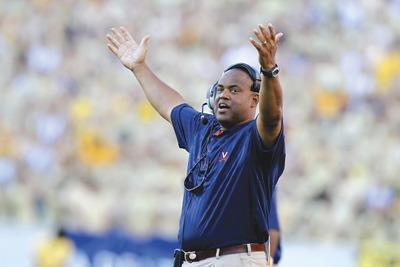 Kevin C. Cox/Getty Images
Mike London and the Virginia football team will hold a practice at Fairfax High School on Saturday and then in Richmond and Virginia Beach the next two weekends.