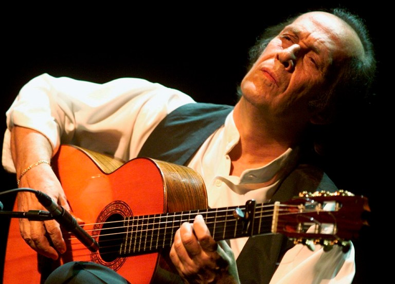 FILE - In this July 12, 2001 file photo, Spanish guitarist Paco de Lucia performs during the 35th Montreux Jazz Festival in Montreux, Switzerland. Jose Ignacio Landaluce, mayor of de Lucia's native Spanish town of Algeciras said in a statement Wednesday Feb. 26, 2014 the world-renowned flamenco guitarist Paco de Lucia has died in Mexico, where he lived. He was 66. The cause of death was not immediately made known. (AP Photo/Keystone, Laurent Gillieron, File)