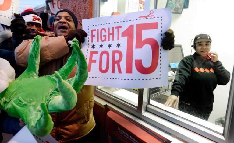 Demonstrations planned in 100 cities are part of push by labor unions, worker advocacy groups and Democrats to raise the federal minimum wage of $7.25. (AP/Paul Beaty)