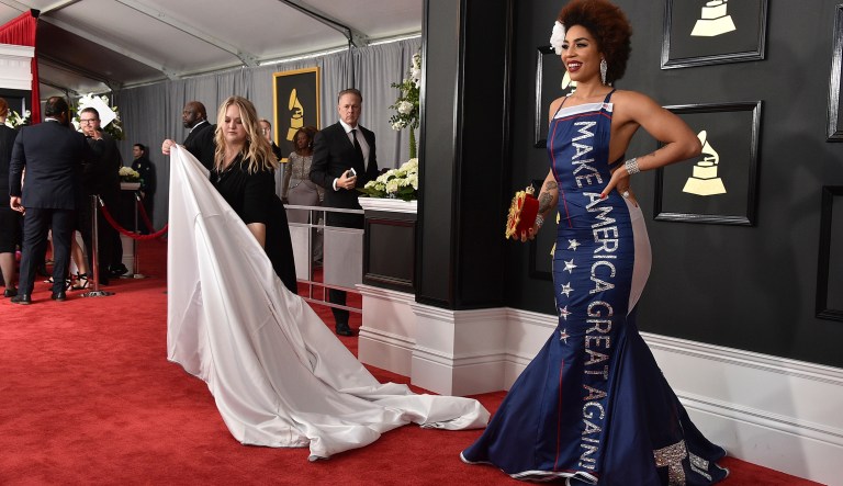 Joy Villa wears a gown that says 