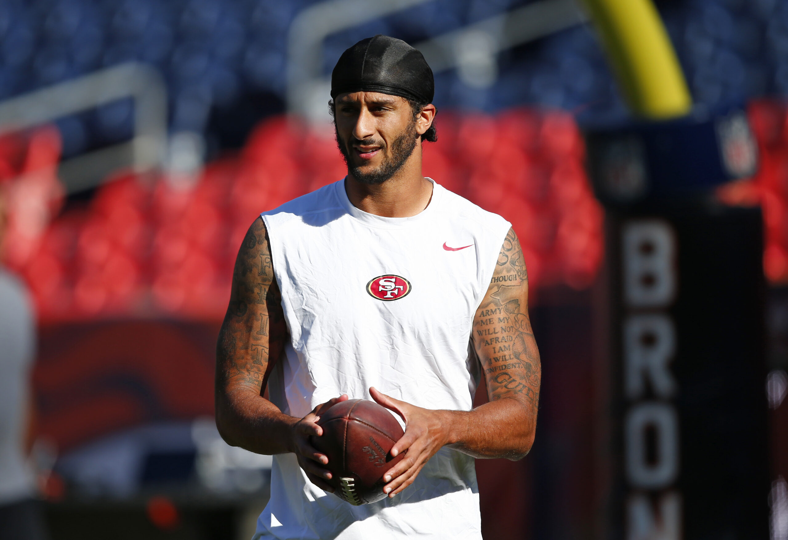 NFL quarterback Kaepernick refuses to stand during national anthem