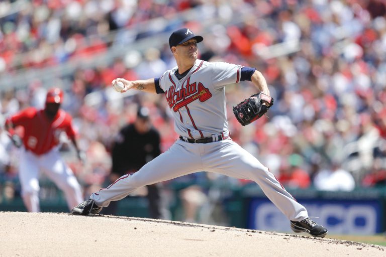 Rob Carr/Getty Images
Tim Hudson improved to 15-5 all time against the Nationals franchise, allowing four hits and one run in seven innings.