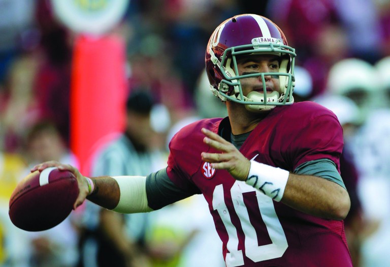 Dave Martin/AP
AJ McCarron threw his first two interceptions of the season in Alabama's loss Saturday.