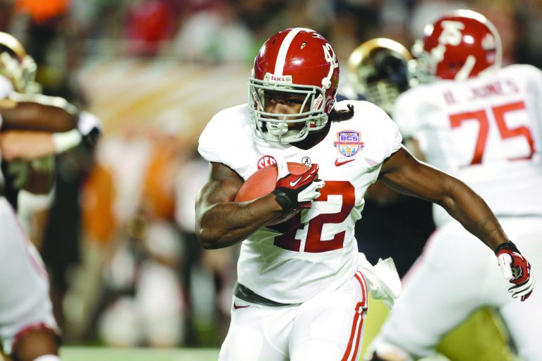 Chris O'Meara/AP
Eddie Lacy ran for 140 yards and scored two touchdowns as Alabama crushed Notre Dame on Monday.