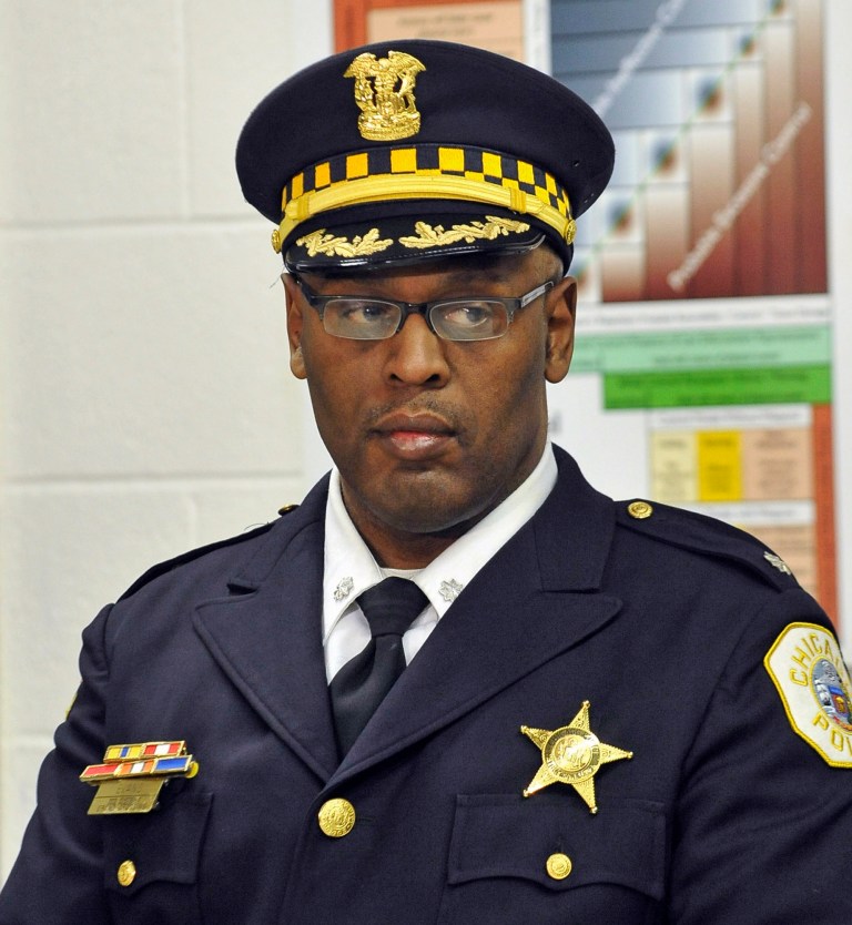 FILE - This Jan. 8, 2013 file photo shows Chicago Police Commander Glenn Evans at a CAPS program event in Chicago. The decorated Chicago police commander, accused of sticking his gun down the throat of a suspect and threatening to kill him, pleaded not guilty on Wednesday, Sept. 24, 2014, to felony counts of aggravated battery and official misconduct. Evans was arrested in August and indicted this month by a grand jury on the felony charges, stripped of his police powers by the department and put on paid administrative duty.  (AP Photo/Sun-Times Media, Brian Jackson)  MANDATORY CREDIT, MAGS OUT, NO SALES