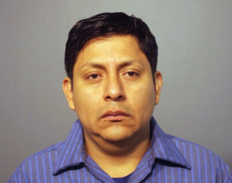 This undated photo provided by the Chicago Police Department shows 40-year-old Jose Quilabaqui, who is one of two men arrested and charged with felony kidnapping. Police say a 15-year-old Chicago boy was handcuffed in a basement by relatives who subjected him to a week of beatings with a belt and doused him with buckets of ice water. The boy escaped Monday, June 23, 2014. Relatives say one of the suspects is the boy's father. (AP Photo/Chicago Police Department)