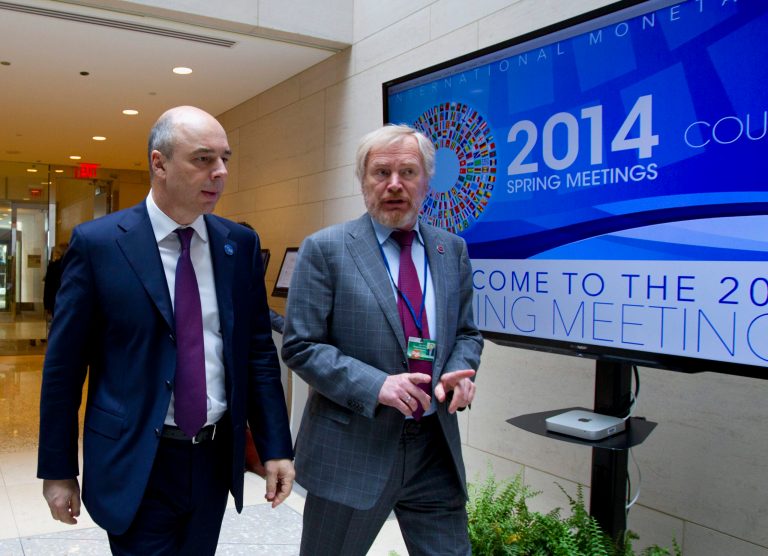 Russian Finance Minister Anton Siluanov, left, and Russian Deputy Finance Minister Sergei Storchak walk to the G20 finance ministers and central bank governors meeting on the sidelines of their meeting at World Bank Group-International Monetary Fund Spring Meetings in Washington on Friday. ( AP Photo/Jose Luis Magana)