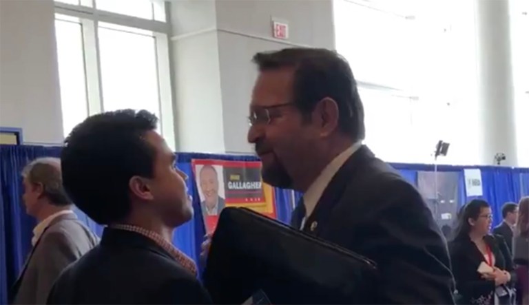 The video shows Sebastian Gorka shaking the hand of reporter Caleb Ecarma, but then, after he realized who the reporter was, Gorka raised a hand to him and then lightly shoved him back. (Twitter)