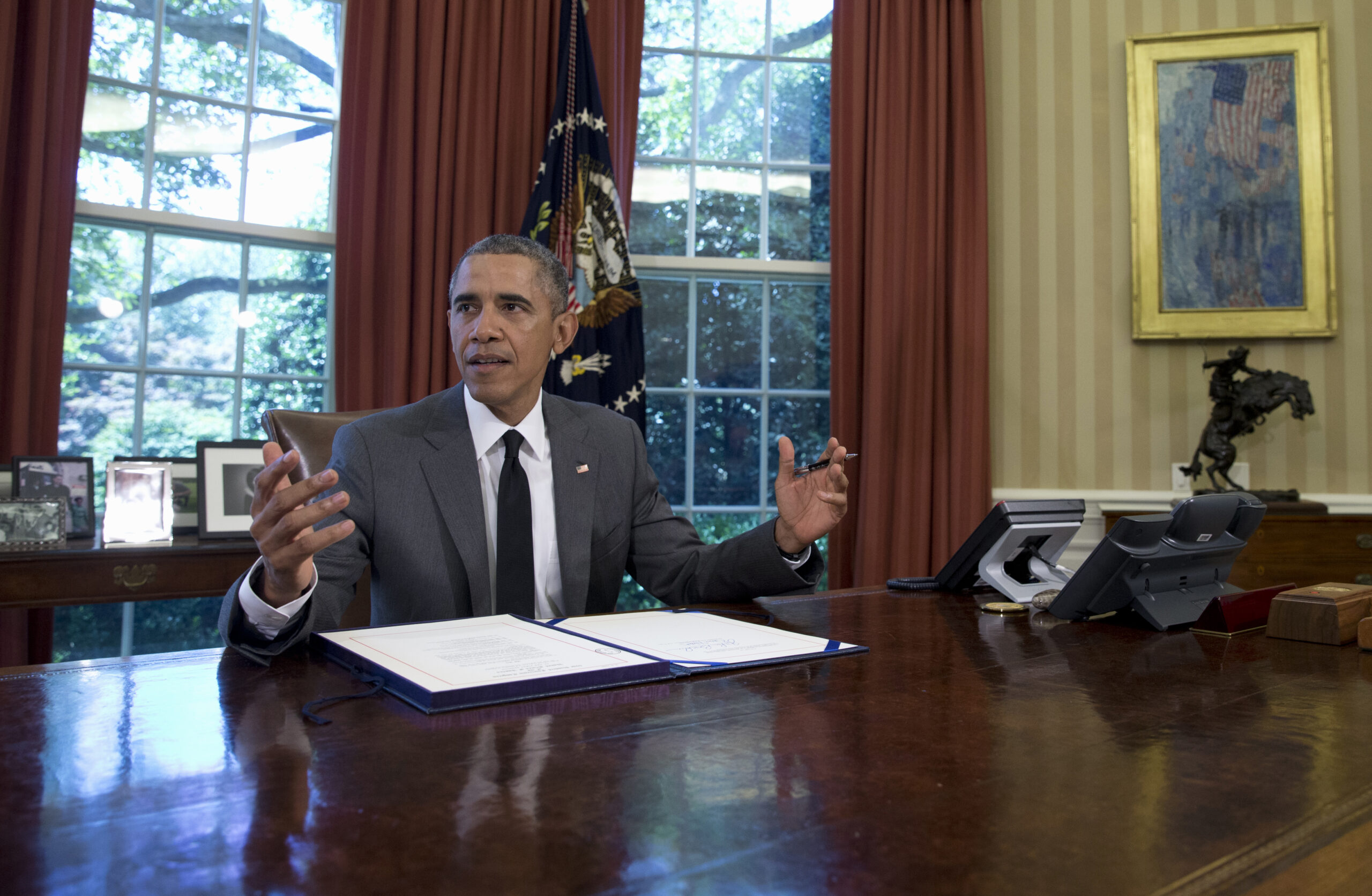 Obama scolds Congress for leaving town