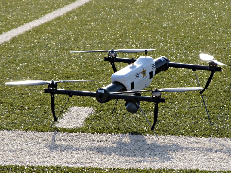 FILE - In this May 14, 2013 file photo, one of several small drones designed for use by law enforcement and first responders is shown at University of North Dakota in Grand Forks, N.D. Michael Huerta, the Federal Aviation Administration administrator, flew to Grand Forks on April 21, 2014 to announce his agency had granted North Dakota a two-year certificate to begin flying a small drone. The announcement made North Dakota the first of six test sites that can begin flying missions.  (AP Photo/Minnesota Public Radio, Dan Gunderson, File)