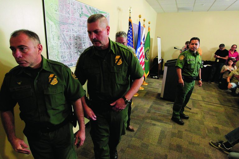 Hours after a U.S. Border Patrol agent was shot and killed, and one other was shot and injured, Manuel Padilla, left, U.S. Border Patrol Acting Chief Patrol Agent Tucson Sector, and Jeffrey Self, U.S. Border Protection Joint Field Command Arizona, leave after a news conference at the U.S. Customs and Border Protection Brian A. Terry Border Patrol Station Tuesday, Oct. 2, 2012, in Bisbee, Ariz.(AP Photo/Ross D. Franklin)