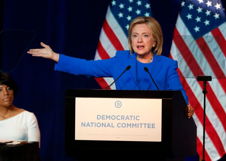 Democratic presidential candidate, Hillary Clinton, addresses the summer meeting of the Democratic National Committee, Friday, in Minneapolis. (AP Photo/Jim Mone)