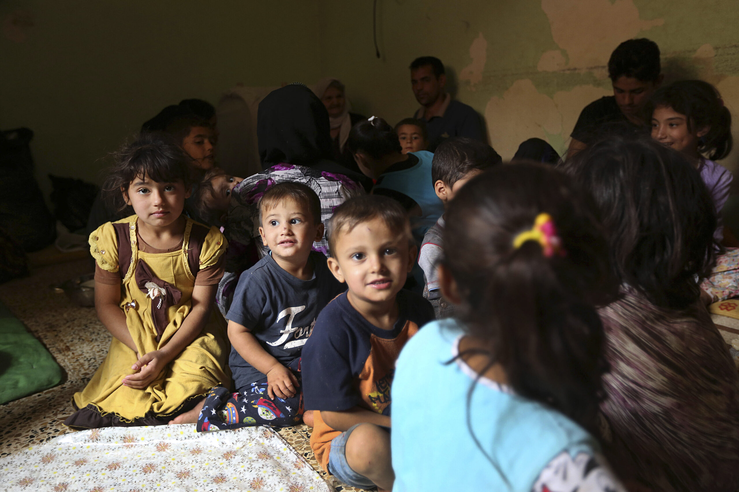 In squalid exile, Iraqi Yazidis hope for return