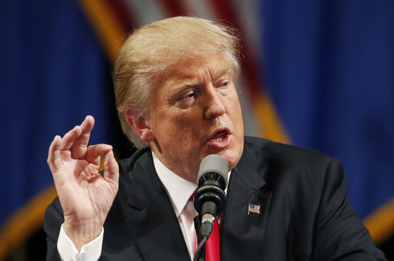 Presumptive Republican nominee Donald Trump defended his business record from Hillary Clinton's recent attacks. (AP Photo/John Locher)