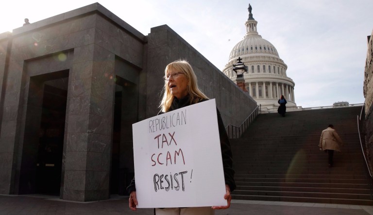Protestors interrupted the Senate's vote on the GOP's tax reform package late Tuesday night. (AP Photo/Jacquelyn Martin)