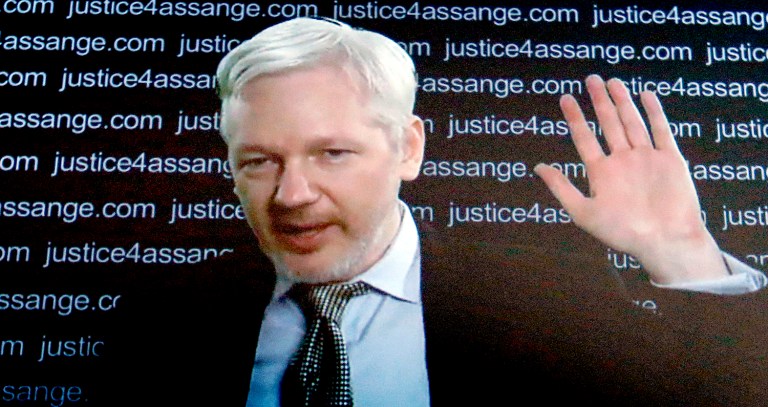 President-elect Trump mentioned Julian Assange in tweets over the past week. (AP Photo/Frank Augstein)