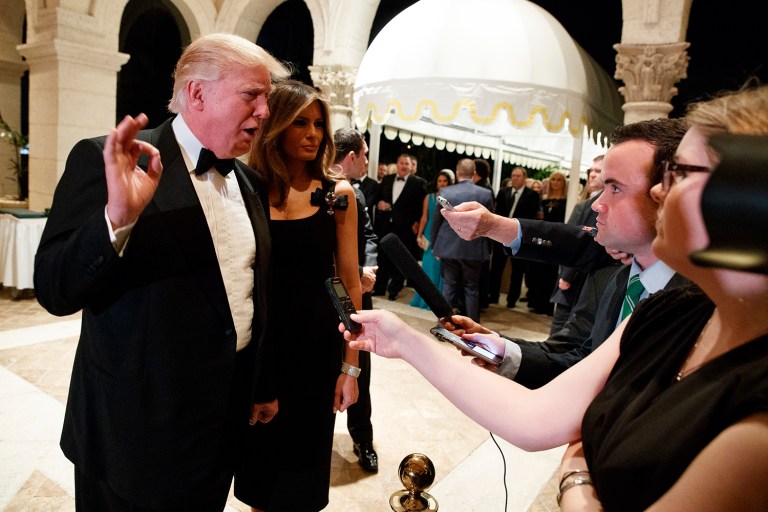 President-elect Donald Trump talks to reporters during a New Years Eve party at Mar-a-Lago, Saturday, Dec. 31, 2016, in Palm Beach, Fla. (AP Photo/Evan Vucci)