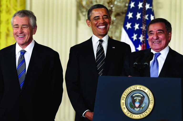 In this Jan. 7, 2013, file photo, President Barack Obama and his choice for Defense Secretary, former Nebraska Sen. Chuck Hagel, left, laugh as current Defense Secretary Leon Panetta speaks in the East Room of the White House in Washington, Monday, Jan. 7, 2013, where the president announced his nomination of Hagel. In 1989, former President Richard Nixon said unless a nominee is clearly unqualified, the Senate should respect the right of a president to fill his Cabinet. Nixon's words came during the bitter fight over President George H.W. Bush's choice of John Tower for the Pentagon post. The Democratic-led Senate rejected him. Now, Obama's choice of Hagel to be defense secretary will be a test for Senate Republicans, including those who fought strenuously for Tower. (AP Photo/Charles Dharapak, file)