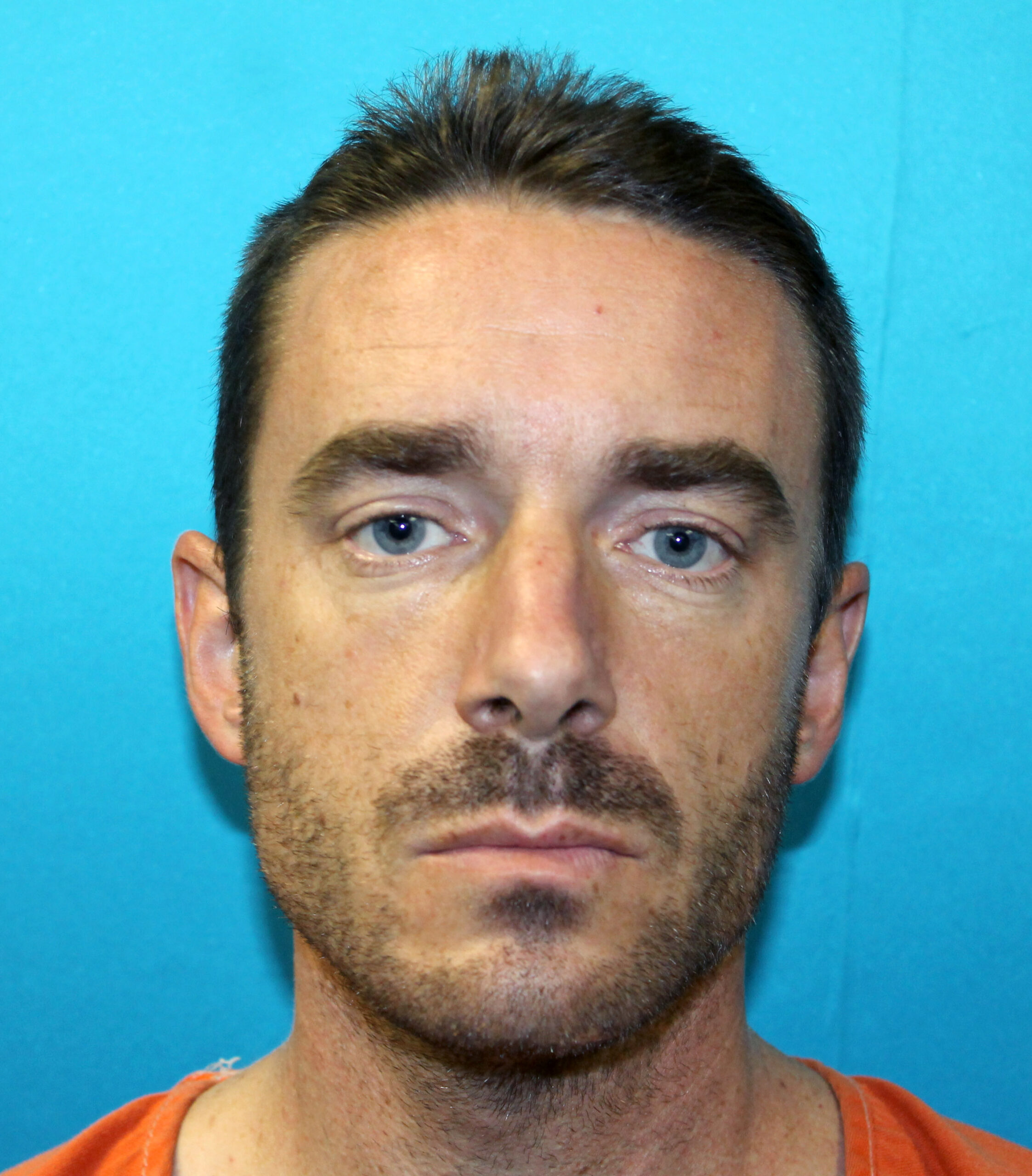 Texas man accused of carving pentagram into son