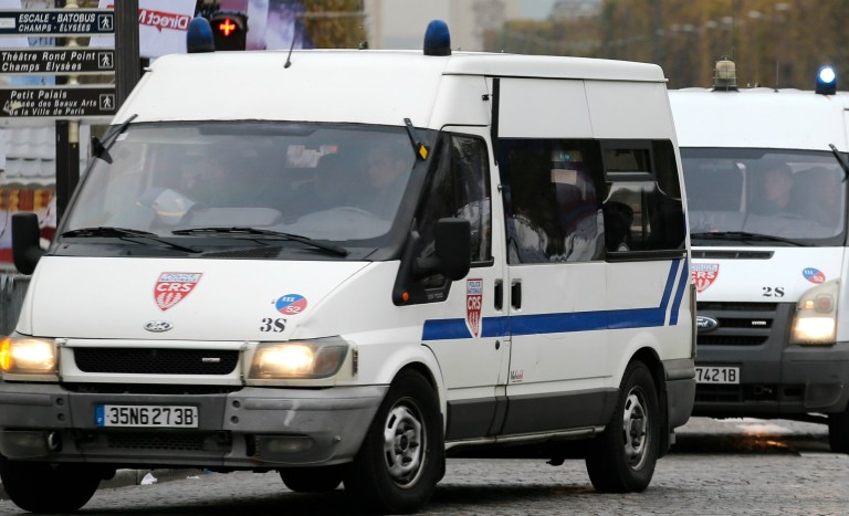 Police raided the house around midnight and found the couple's child alive. The infant was rescued and removed from the house. (AP Photo/Christophe Ena)
