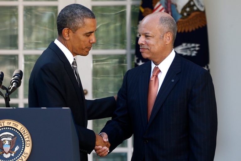 President Barack Obama shakes hands with Jeh Johnson, his choice for the next Homeland Security Secretary, in the Rose Garden at the White House in Washington, Friday, Oct. 18, 2013. (AP Photo/Charles Dharapak)