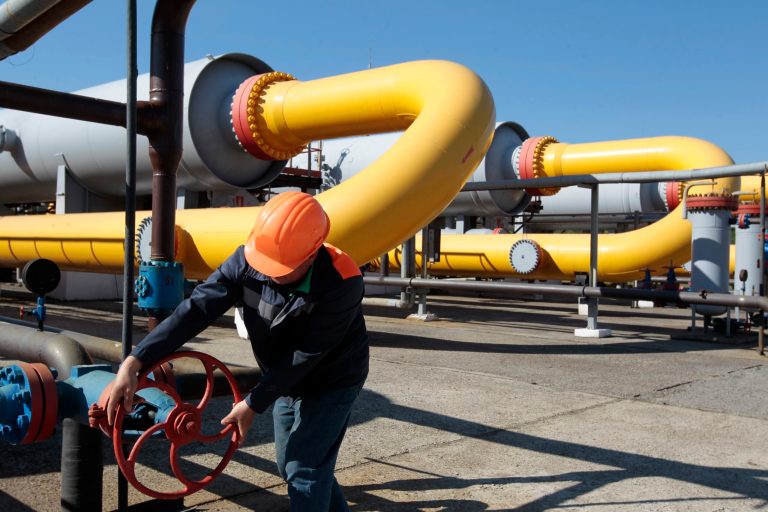 FILE - In this Wednesday May 21, 2014 file photo, a Ukrainian worker operates a valve in a gas storage point in Bil 'che-Volicko-Ugerske underground gas storage facilities in Strij, outside Lviv, Ukraine. Russia on Monday, June 16, 2014, cut gas supplies to Ukraine as a payment deadline passed and negotiators failed to reach a deal on gas prices and unpaid bills amid continued fighting in eastern Ukraine. The decision does not immediately affect the gas flow to Europe, but could disrupt the long-term energy supply to the region if the issue is not resolved, analysts said. (AP Photo/Sergei Chuzavkov, file)